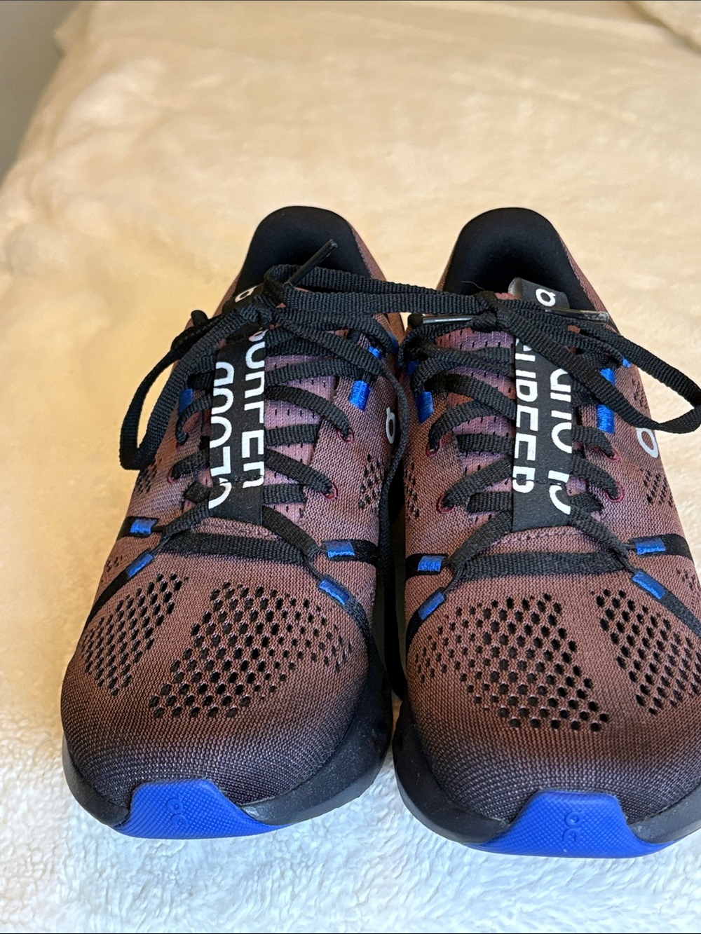 On Running Women's Purple and Black Athletic Shoes with Blue Accents